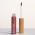 Elate gloss with wooden applicator on a light background