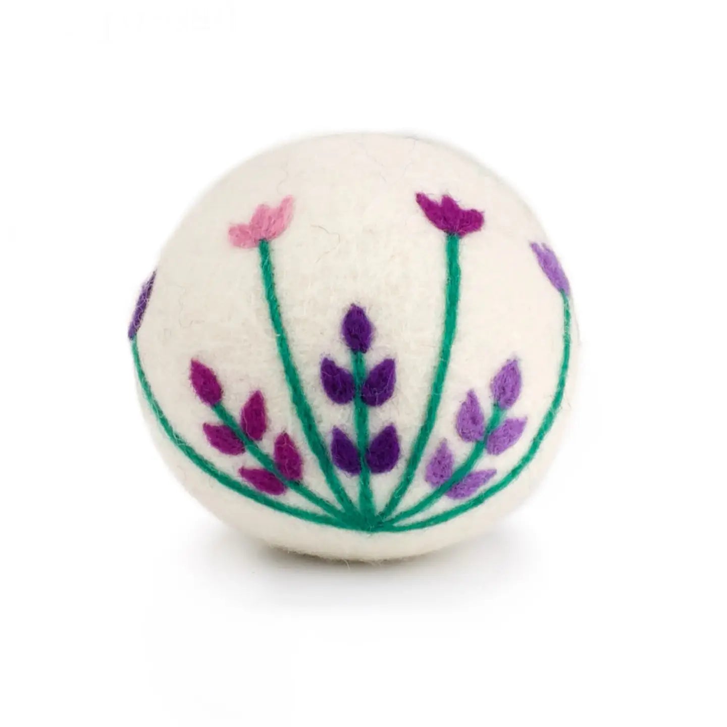 White dryer ball with floral design featuring purple and green on a white background