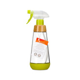 clear spray bottle with green accents and bamboo
