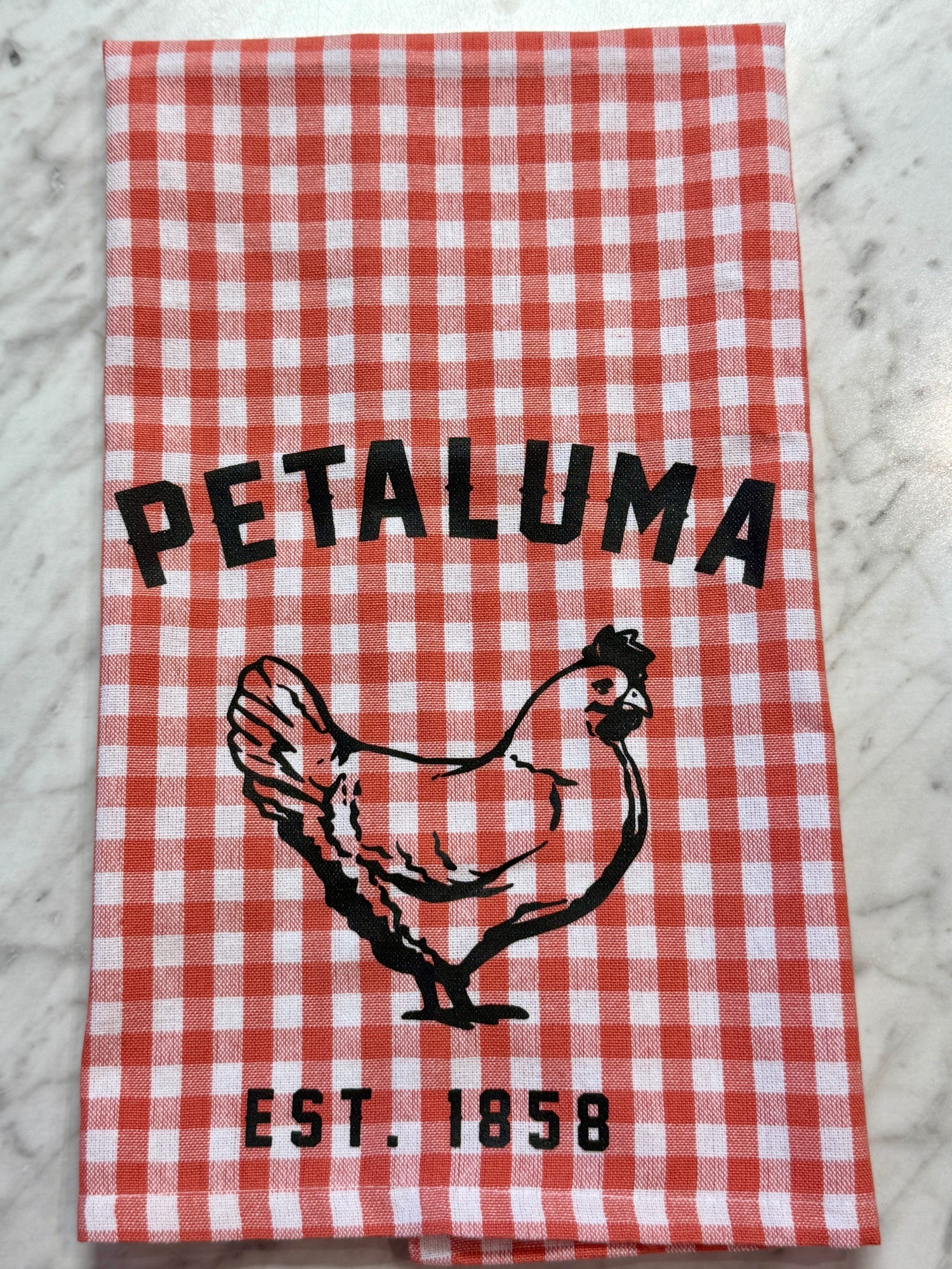 Red and white checkered towel with &