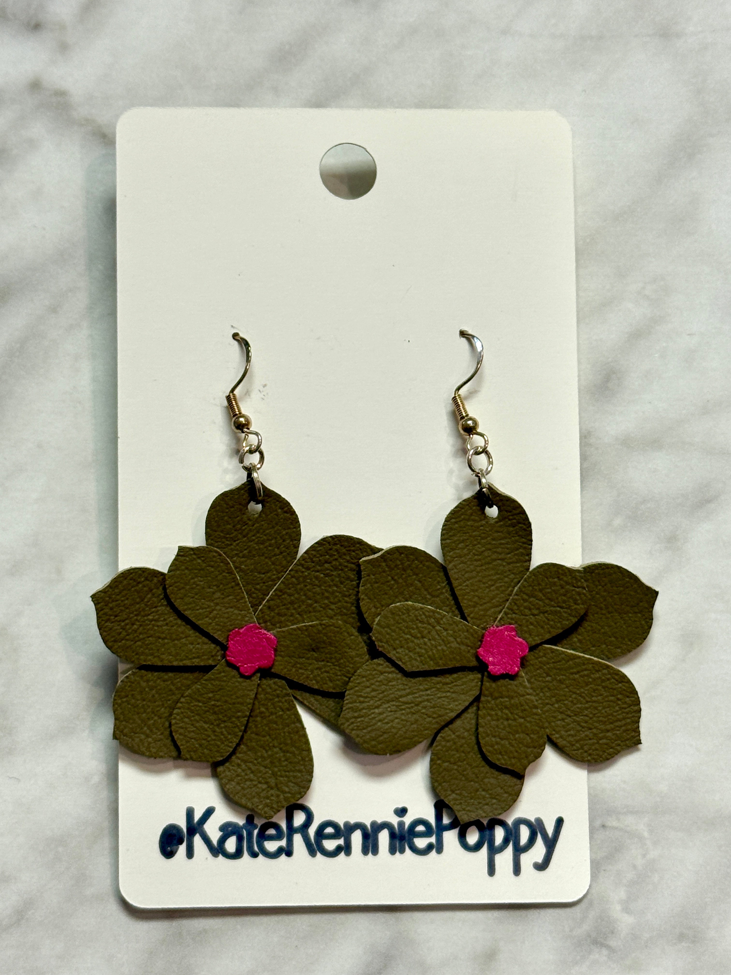 Olive green Flower-shaped earrings on a card with &