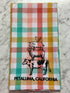 Checkered towel with animal illustrations and &