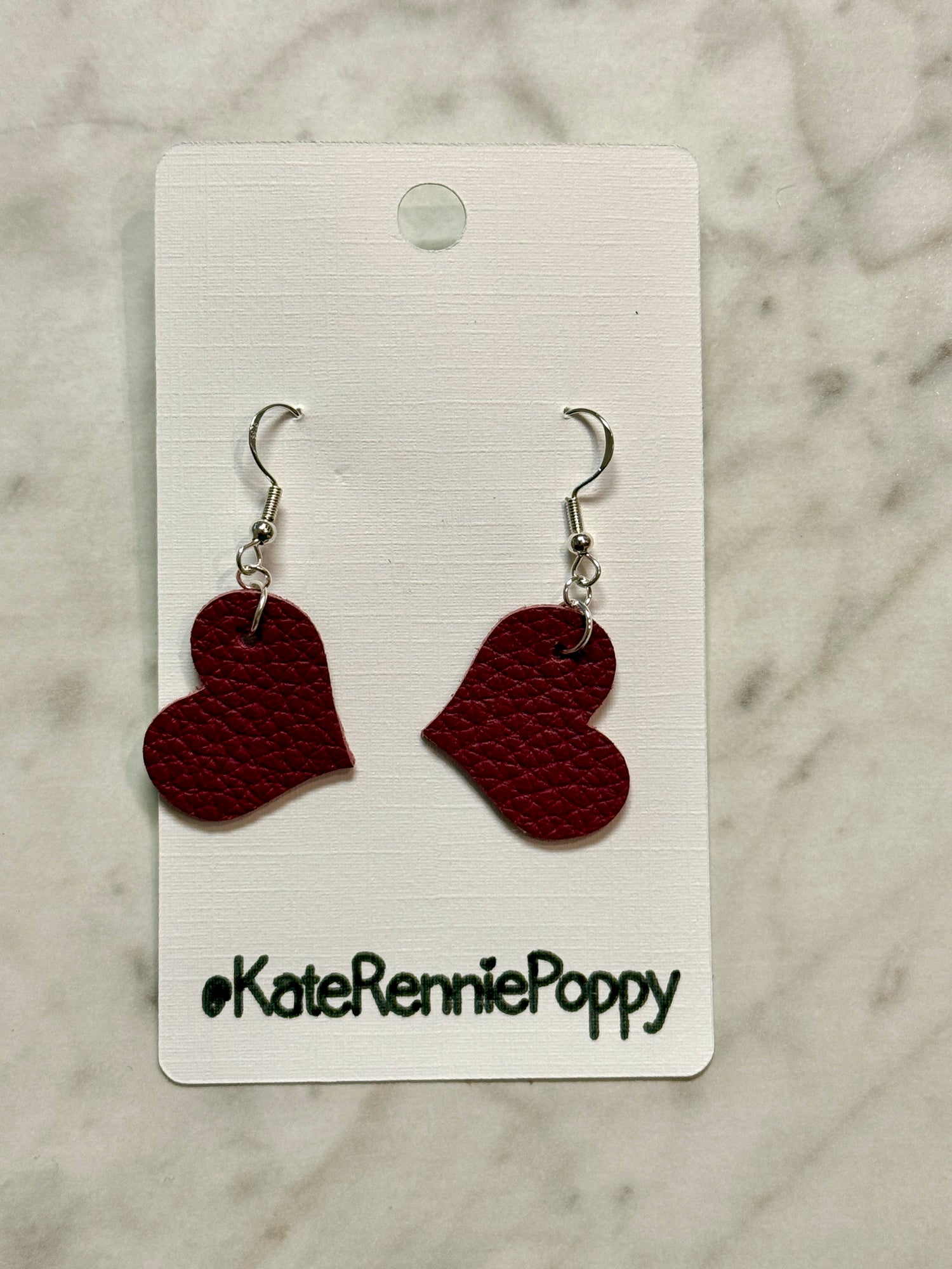 Heart-shaped earrings on a &