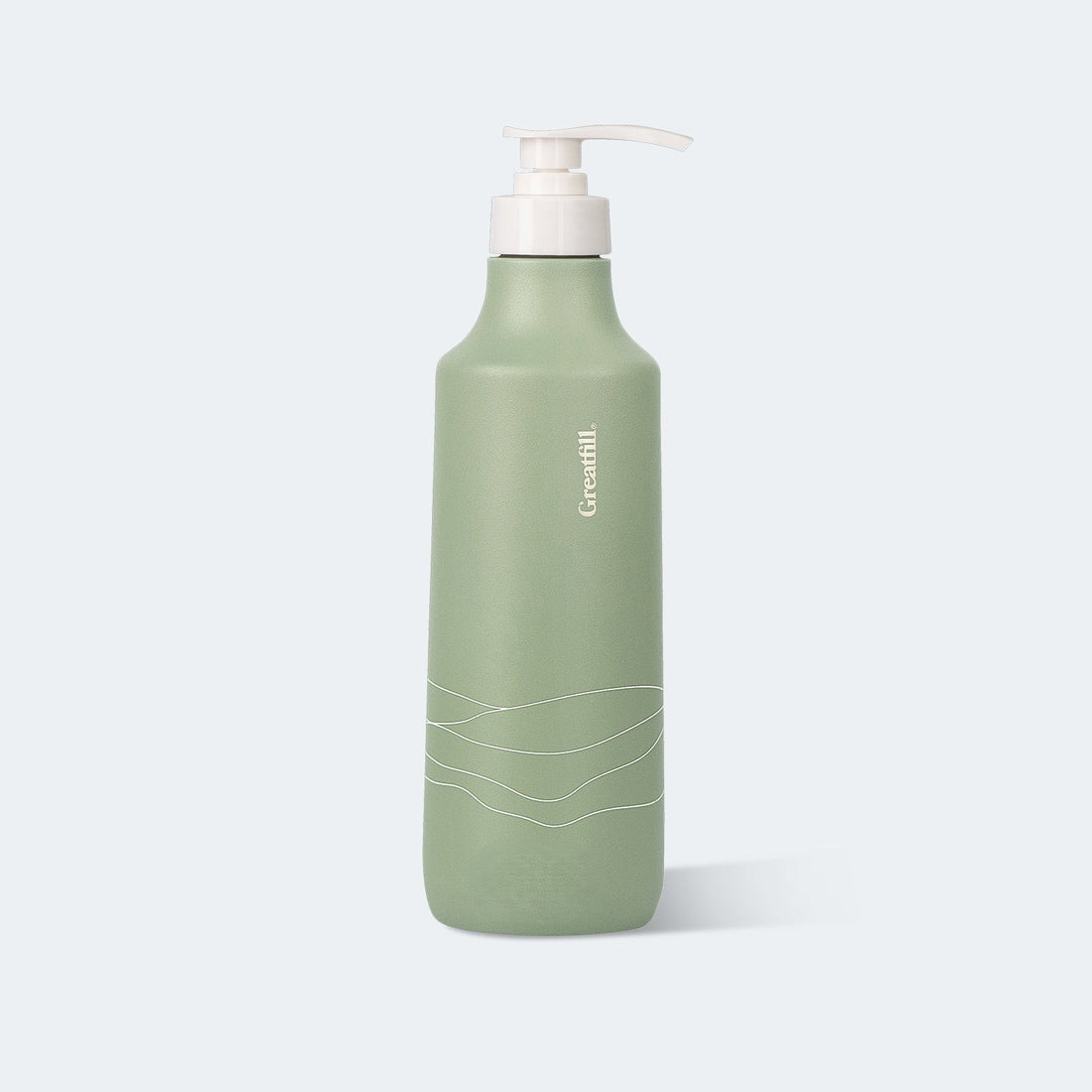 Green bottle with pump dispenser on a light gray background