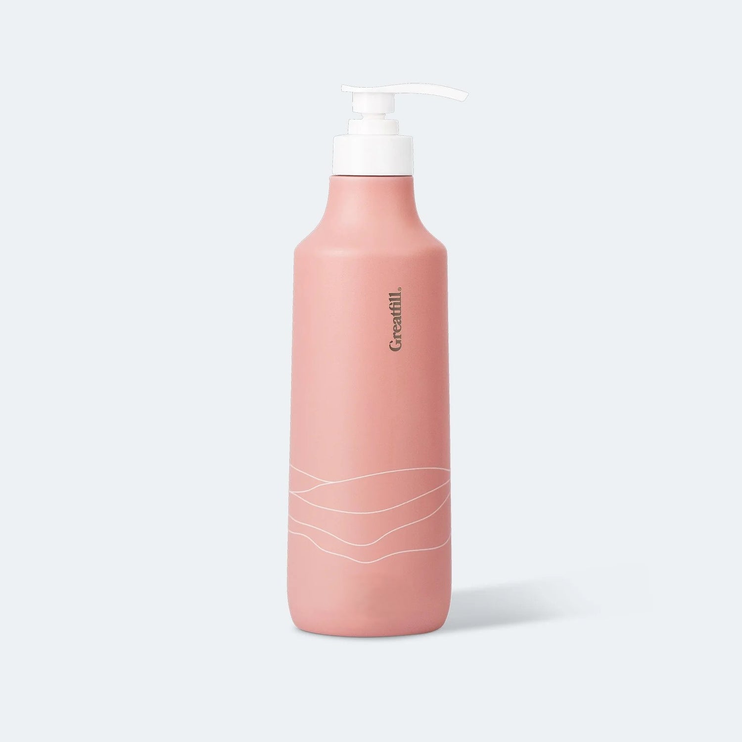 Pink bottle with pump on a light gray background