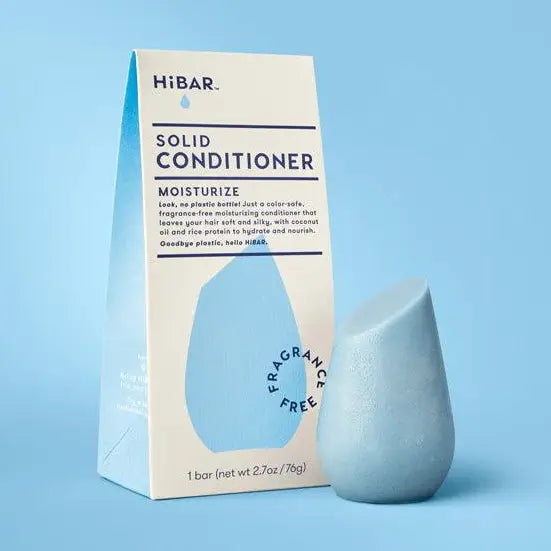 Solid conditioner bar and packaging on a blue background