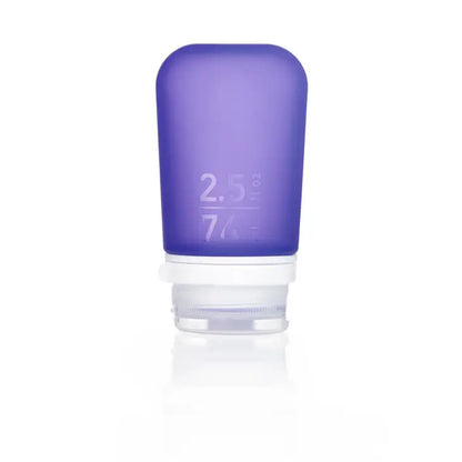 The Humangear GoToob+ is a purple silicone 2.5 oz (74 ml) travel bottle with a white cap, standing upright on a white background—one of the best leak-proof containers for toiletries.