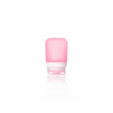 The Humangear GoToob+ is a small, translucent pink silicone travel bottle with a white screw-on cap—ideal as a refillable toiletry container for hassle-free trips.