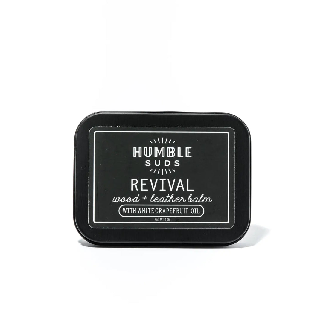 Black tin of humble suds revival wood and leather conditioner