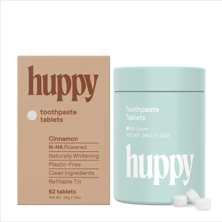 huppy toothpaste tablets packaging with a mint green container on a white background