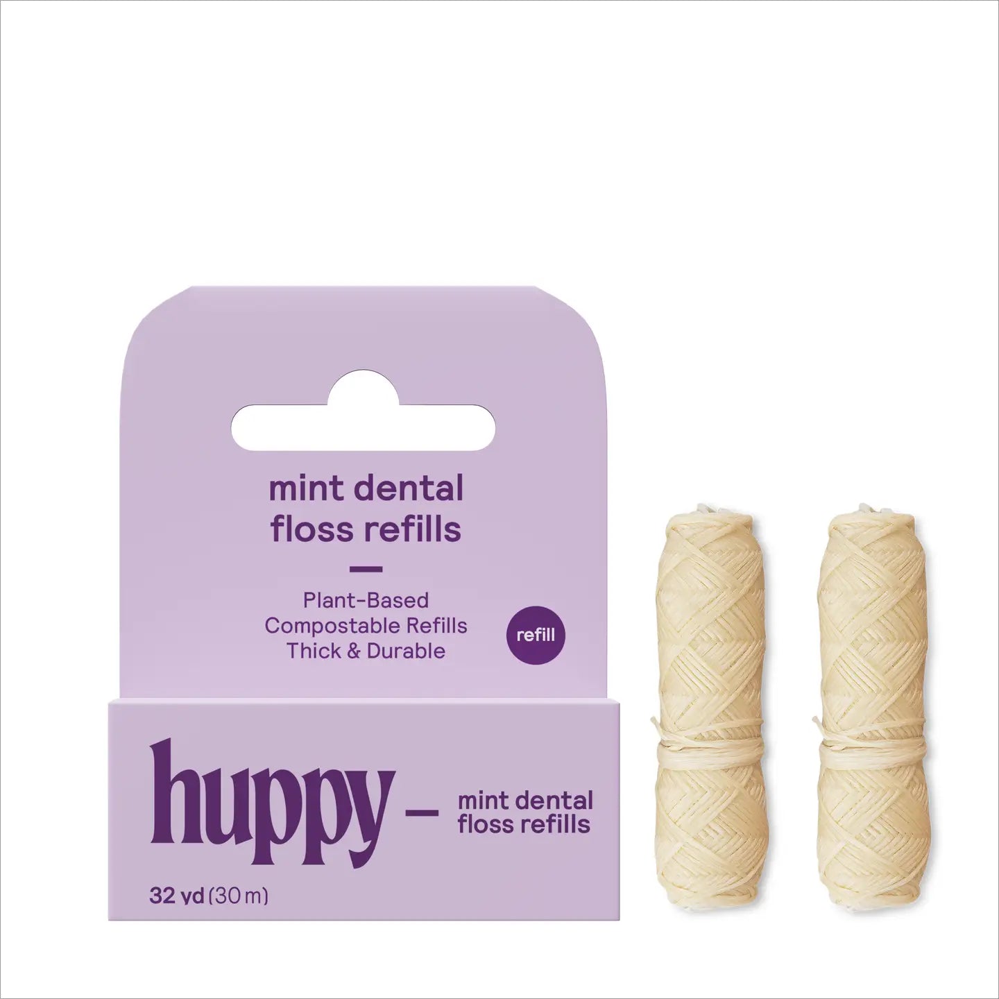 Huppy mint dental floss refills packaging with two floss rolls on a white background