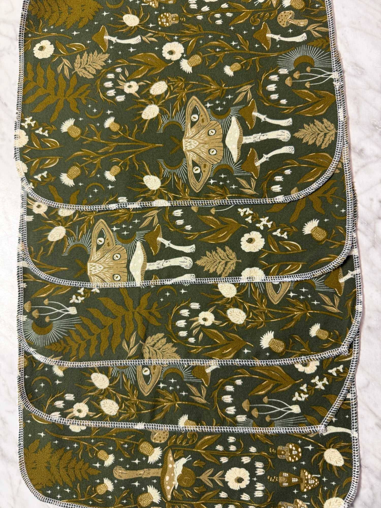 5 not paper towels with nature-themed pattern on a white background