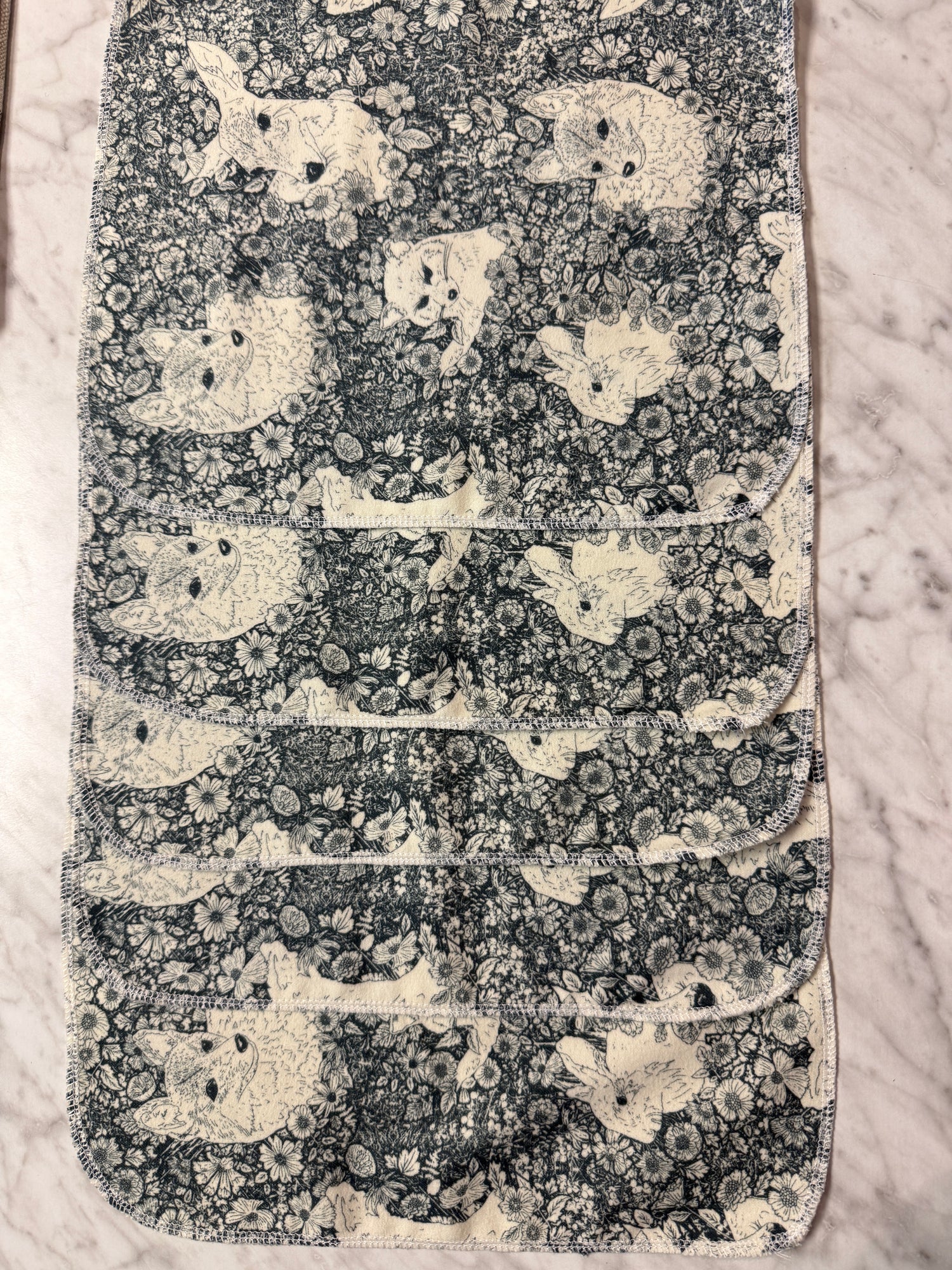 Decorative, not paper towels with animal pattern on a marble surface