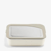 The Klean Kanteen Stainless Steel Lunch Box 34 oz is shown with a transparent lid against a white background. Featuring rounded corners and a simple modern design, it’s ideal for sustainable food storage.