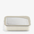 The Klean Kanteen Stainless Steel Lunch Box 34 oz is shown with a transparent lid against a white background. Featuring rounded corners and a simple modern design, it’s ideal for sustainable food storage.