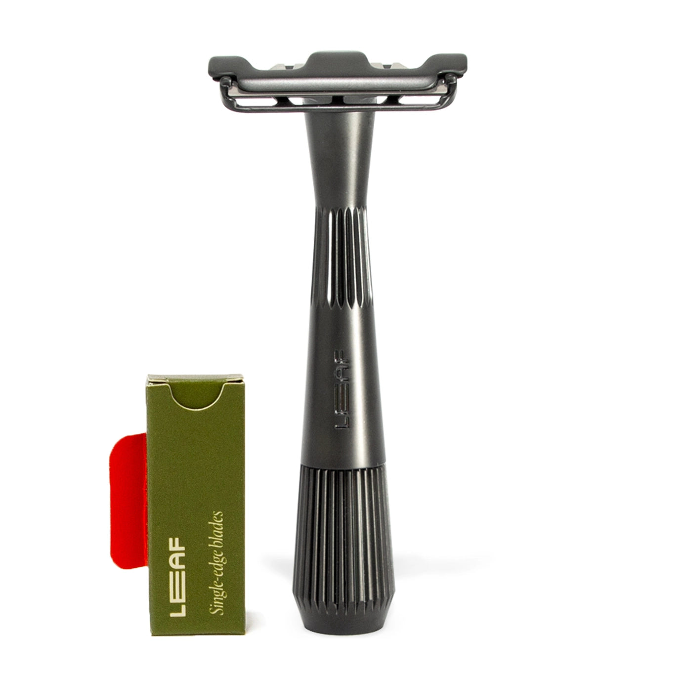 black leaf razor thorn with a small pack of starter razor blades next to it