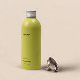 leaf shave oil in a green aluminum bottle with a small funnel to the side