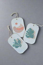 3 pop up sponges with strings attached