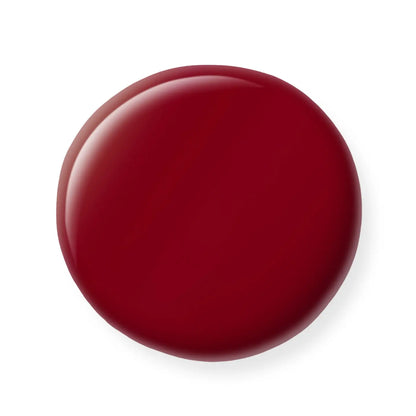 Red nail polish sample on a white background