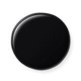 Black circular object on a white background