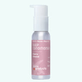 Plaine Products Deep Conditioner bottle with cherry almond scent on a white background