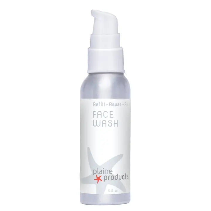 small aluminum face wash bottle with white pump top