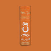 Lip balm container with branding on an orange background
