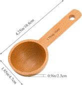 The Refill Mercantile Tablespoon Measuring Spoon is food grade wood, 4.25" long, 1.85" wide, and 0.9" deep. The handle is marked "1 Tbsp 15ml," making it perfect for baking or as a laundry soap scoop.