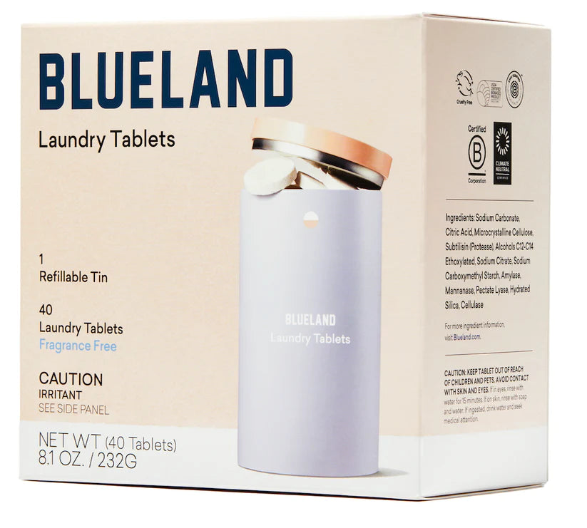 A box of Blueland Laundry Tablets with a light blue refillable tin displays 40 fragrance-free tablets made with clean ingredients; packaging notes they are an irritant.