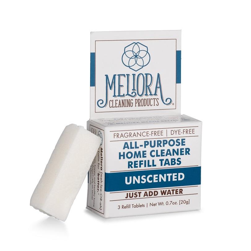 A box labeled “Meliora All-Purpose Cleaner Tablet Refill” with one white tablet beside it. The plastic-free packaging notes that this cleaner is both fragrance-free and dye-free.
