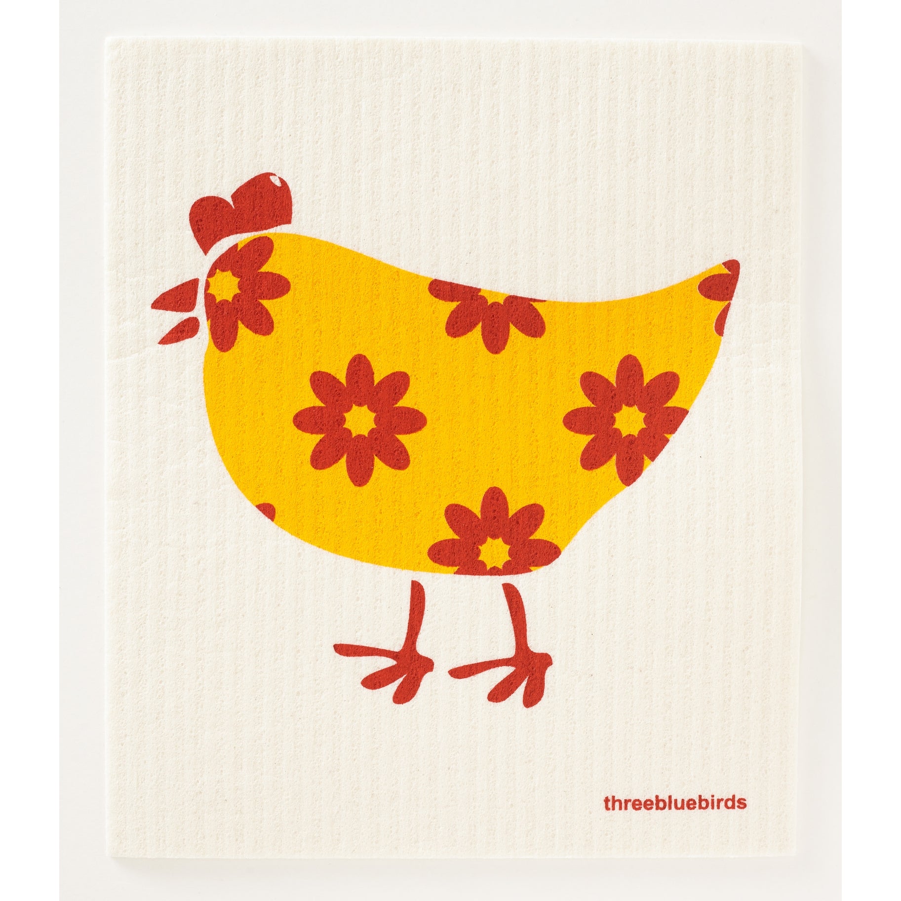 The Birds and Chickens Swedish Dishcloth by Three Bluebirds Swedish Dishcloths features a yellow chicken with red flowers and legs on a white textured background, plus the "threebluebirds" logo in red for a stylish, sustainable clean.