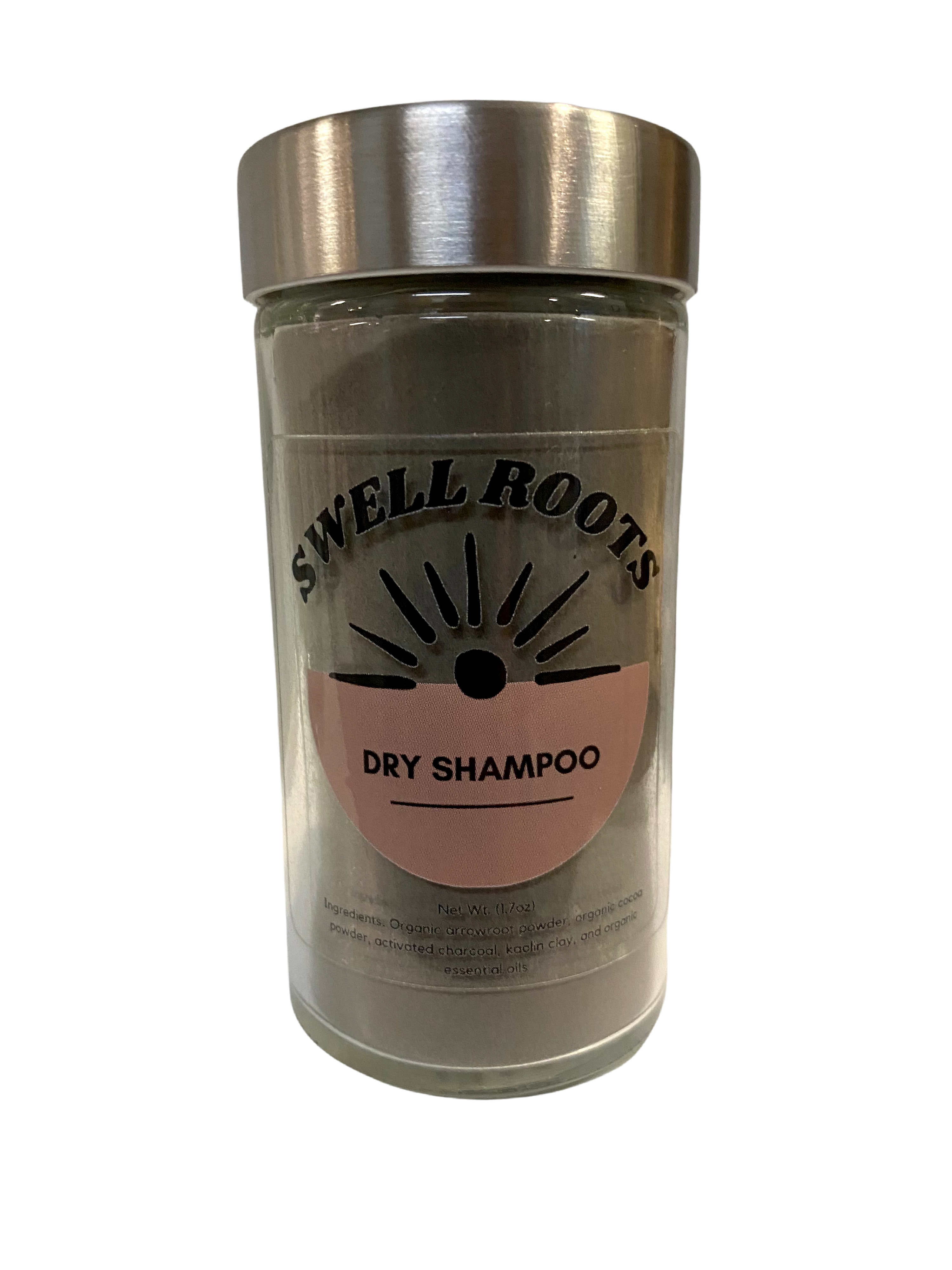 A clear glass jar with a metal lid labeled Swell Roots Dry Shampoo features a sunburst design and pink half-circle, highlighting this all-natural product with ingredient details listed at the bottom.